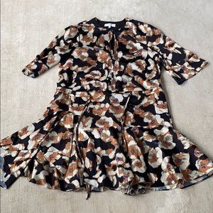 Elegant shirt dress takes you from day to evening.